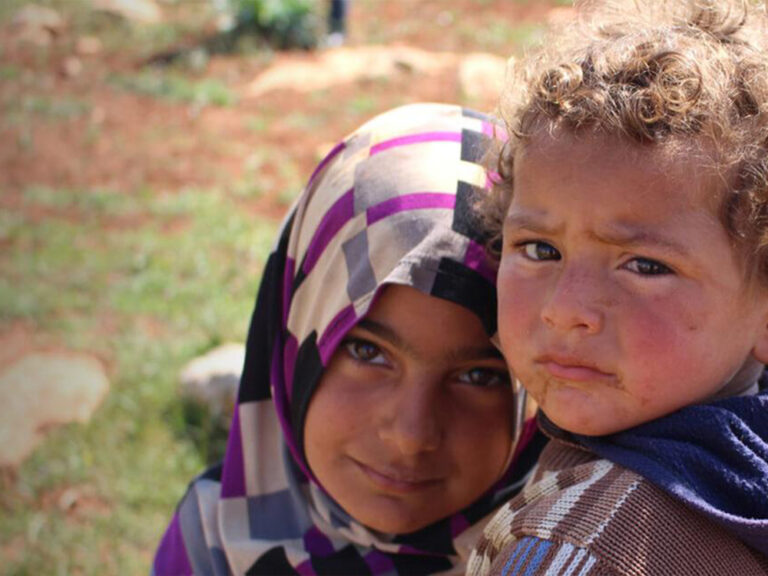 Two Syrian children in refugee camp