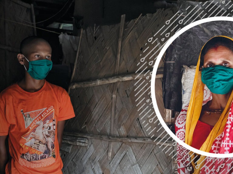 woman and son outside home destroyed by climate change in india