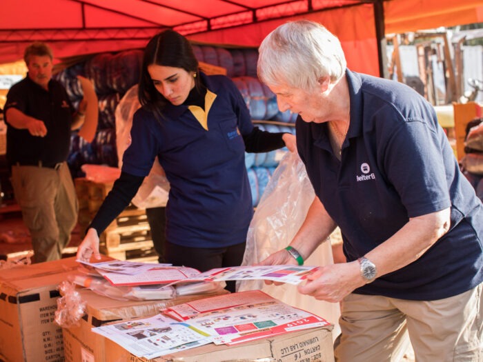 People packing aid in Paraguay