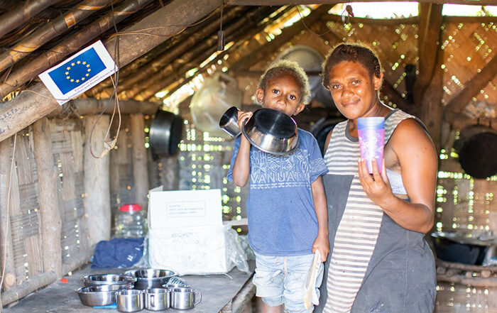 Woman and child in a home in Vanuatu