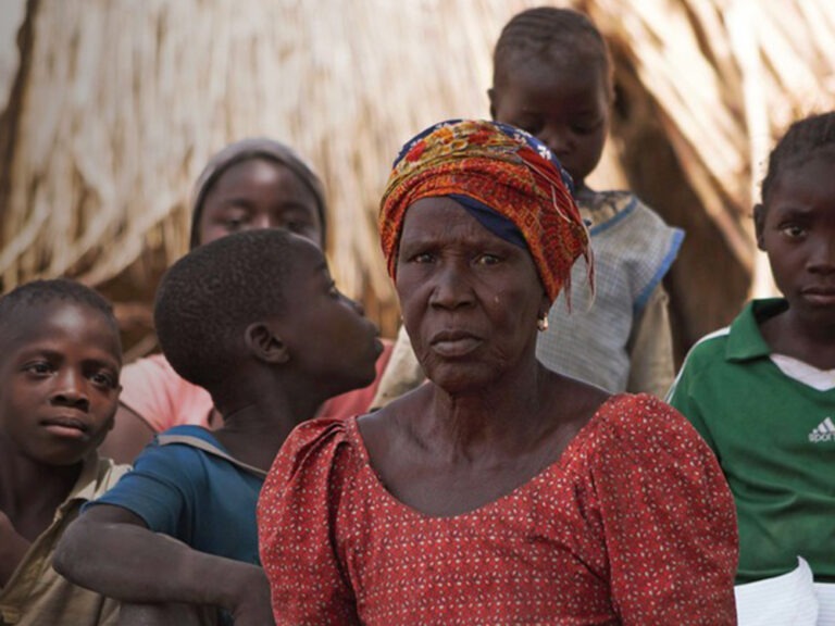 A woman and children sat down