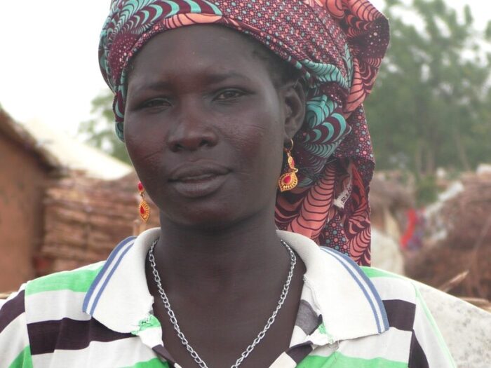 Woman wearing red scarf in her hair