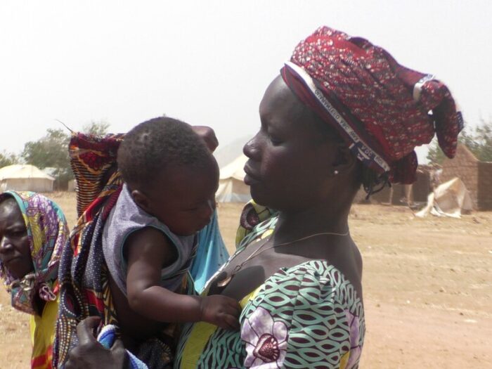 Woman holding a baby
