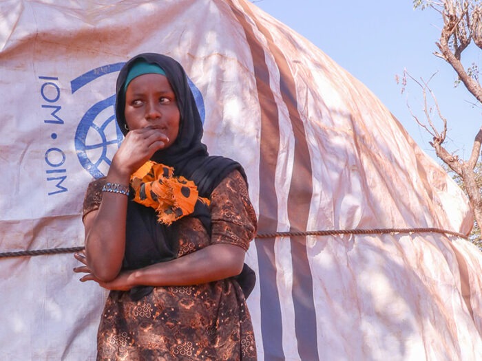 Woman outside a shelter in Ethiopia