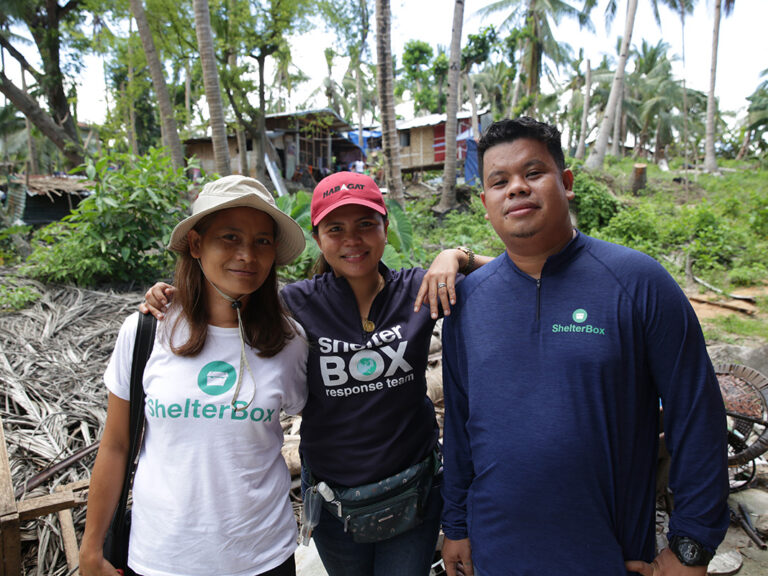 Two women and a man in the Philippines