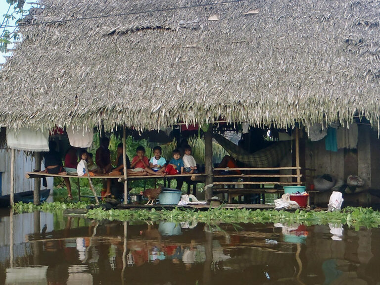 Building next to flooding in Peru