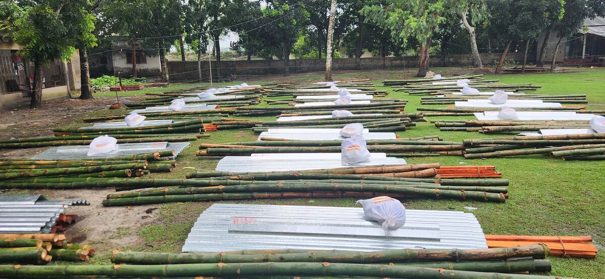 Piles of wood and metal to help repair buildings and build shelters in Bangladesh