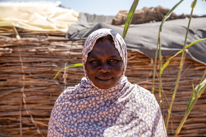 A woman looking at the camera in Chad.