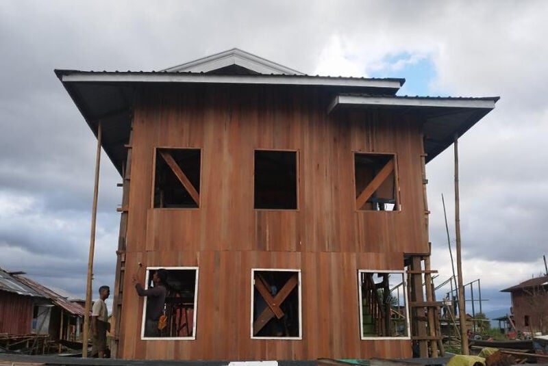 repairs on a shelter.